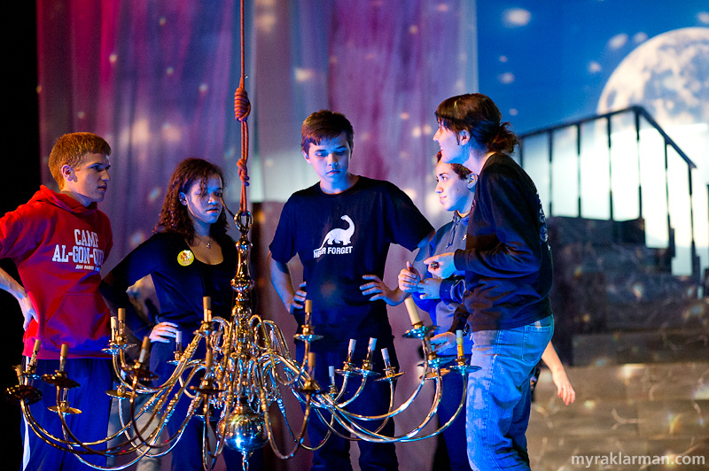 Pioneer Theatre Guild: Phantom of the Opera | The chandelier, which falls at the end of Act II, presented several logistical challenges. (l-r: crew members Joe Weindorf, Rianna Johnson-Levy, and Dylan Summers; PTG alumna Amira Belwafa; and shop supervisor, Ciara Stella)