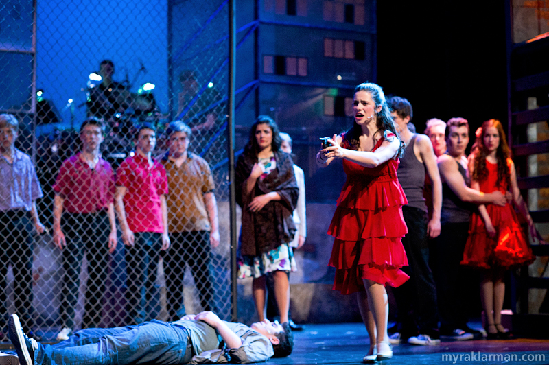 Pioneer Theatre Guild: West Side Story | After Tony is shot, Maria pulls the gun on the gang members. (Clare Higgins)