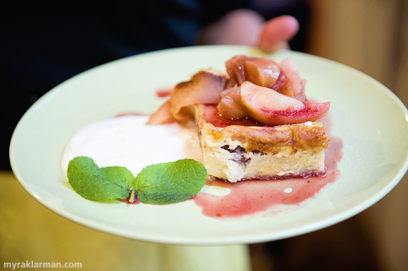 Catching Up with Selma Café | Cherry bread pudding topped with warm apple compote and a side of whipped cream.