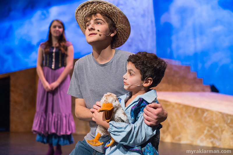 Pioneer Theatre Guild: Pippin | When Theo’s (Ethan Steiner) duck gets sick, Pippin (Oren Steiner) comforts him with prayer. “God, I know this is going to sound ridiculous, but this boy loves his duck.”