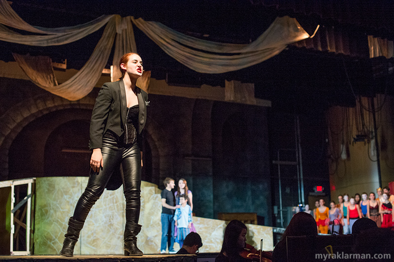 Pioneer Theatre Guild: Pippin | When Pippin chooses the simple life over a life of glory, Leading Player (Emma McGlashen) becomes furious and yells at troupe members to stop the show and take down the lights, props, and sets.