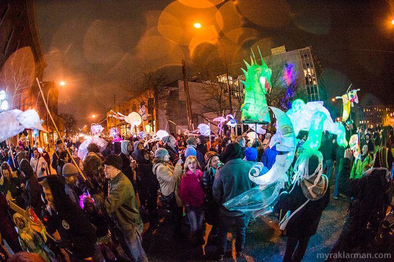 FoolMoon 2014 | All three processionals (from UMMA, Kerrytown, and Slauson Middle School) converged at the corner of Ashley and Washington. Given the freezing rain, the high luminary-to-spectator ratio can only lead to one logical conclusion: if THEY build it, THEY will come. 