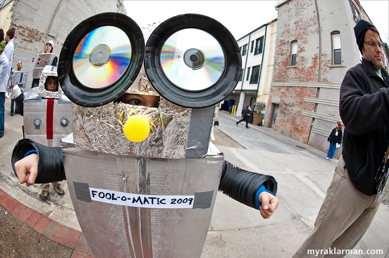 FestiFools 2009 | Shortly after 2pm (on Sunday, April 5, 2009), a 6-year-old boy named Max, who resides within the Ann Arbor city limits, entered 826michigan for their special Robot-Costume-Building Workshop. At approximately 3:35pm, this Fool-O-Matic (model no. 2009) robot emerged from the premises. There was no trace of the boy!