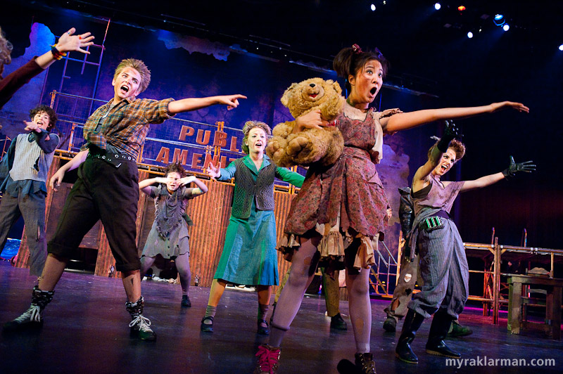 Pioneer Theatre Guild: Urinetown | The impoverished denizens of Urinetown perform the title number. Both times I saw the show (shooting the dress rehearsal, and in the audience with Max and Rico at the first matinee), I was amazed with the energy of the performances — these kids don’t hold anything back. 