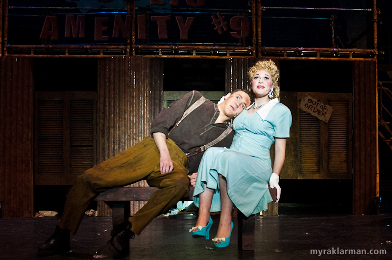 Pioneer Theatre Guild: Urinetown | NEW PHOTO: Hope Cladwell (Mara Abramson) insists that Bobby Strong (Robby Eisentrout) listen to her heart, literally: “Someday I’ll meet someone / Whose heart joins with mine / Aortas and arteries all intertwined…”
