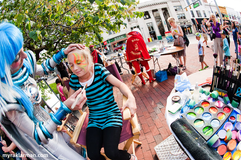 First Friday: Ann Arbor Summer Festival 2009 | “Extreme” face painters from Body Masterpiece demonstrate their transformative powers on the corner of State and North University. I was totally enthralled watching these artists literally paint the town. Costuming to the Nth degree? Check! Seemingly infinite collection of tools and hues? Check! 