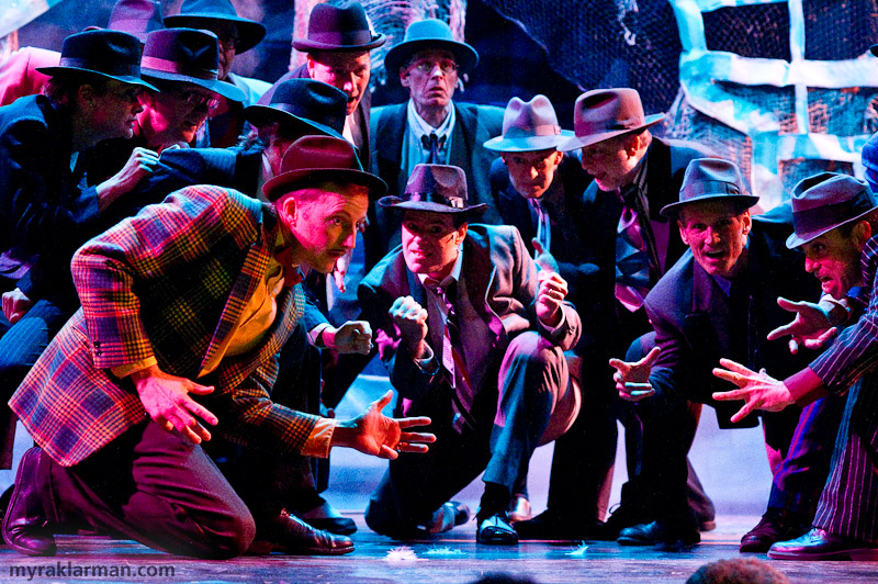 Burns Park Players: Guys and Dolls | Dress rehearsal of the crapshooters dance. Staged and lit like a Diego Rivera mural. 