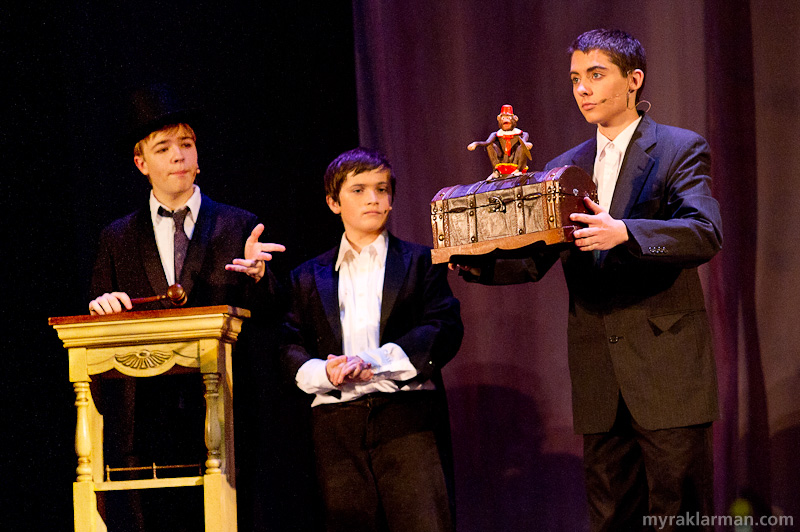 Pioneer Theatre Guild: Phantom of the Opera | Prologue: Relics up for auction in 1911 at the (by then decrepit) Paris Opera House foreshadow key events in the plot, the entire action of which occurs within a single flashback to the 1880s. (Jackson Tucker-Meyer, Isaiah Davis, and Conor Howe)